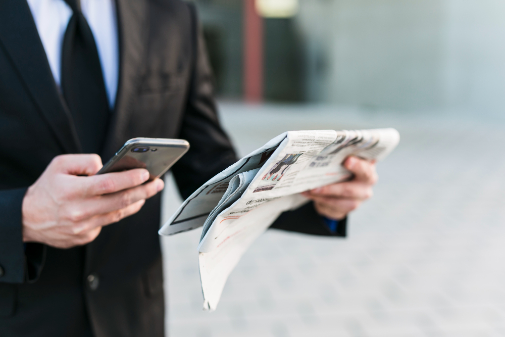 business-man-using-his-mobile-phone