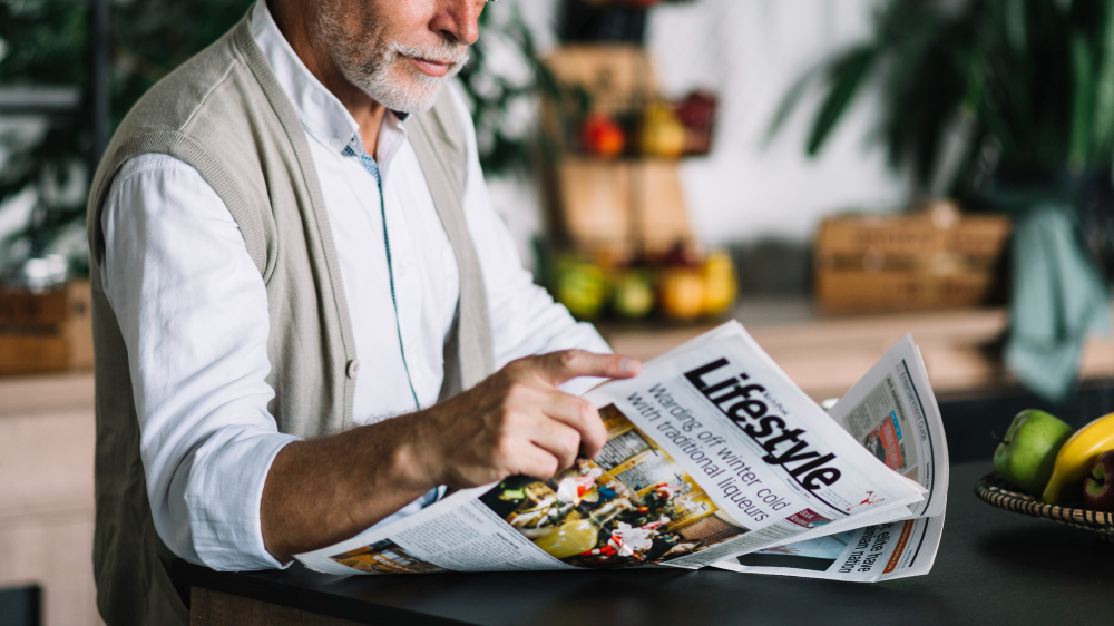 close-up-man-reading-newspaper